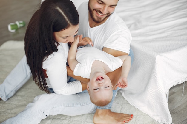 Beautiful family spend time in a bathroom