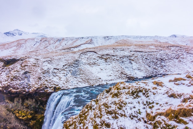 Beautiful famous waterfall in Iceland, winter season .