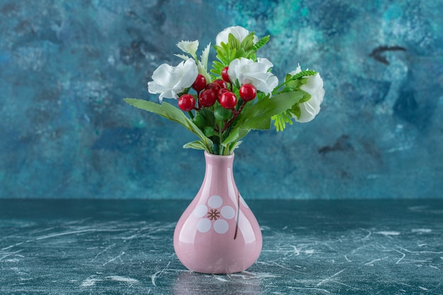 Free Photo beautiful fragrance flowers and vase , on the blue background.