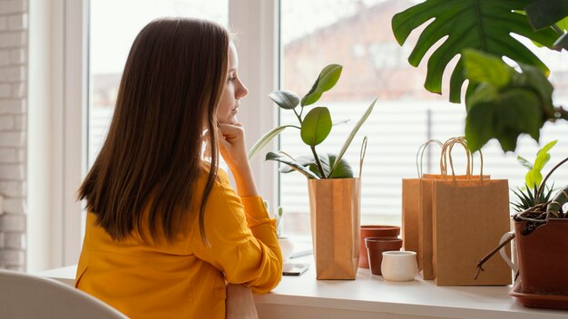 Beautiful gardener sitting on a chair