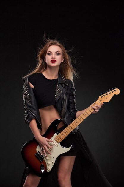 Beautiful girl playing guitar