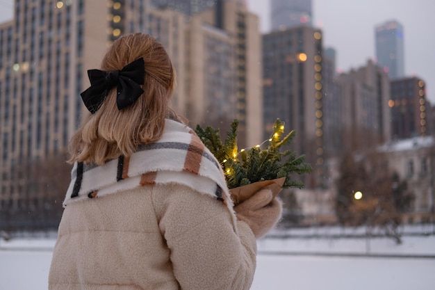 Beautiful girl posing on the street in winter Moscow