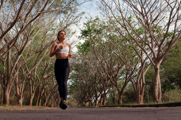 Beautiful girl runs into the autumn. bali