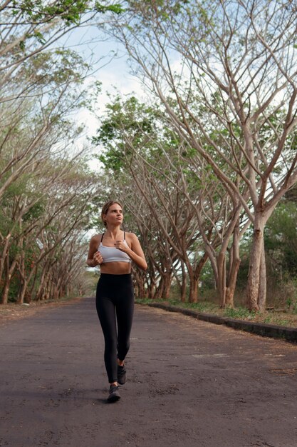 Beautiful girl runs into the autumn. bali