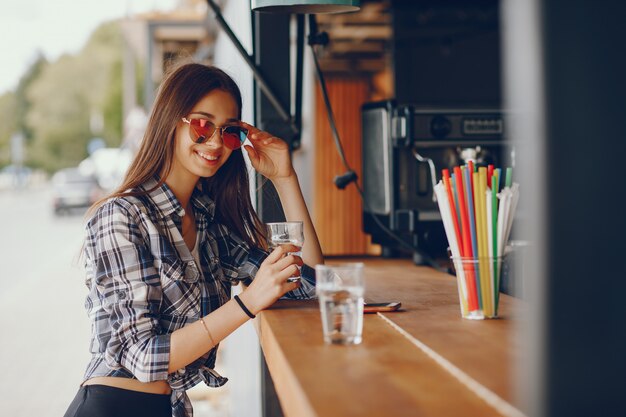 A beautiful girl sitting in a cafe