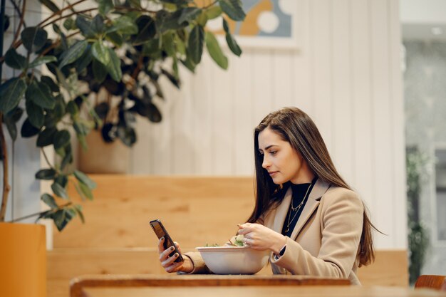 Beautiful girl sitting in a cafe