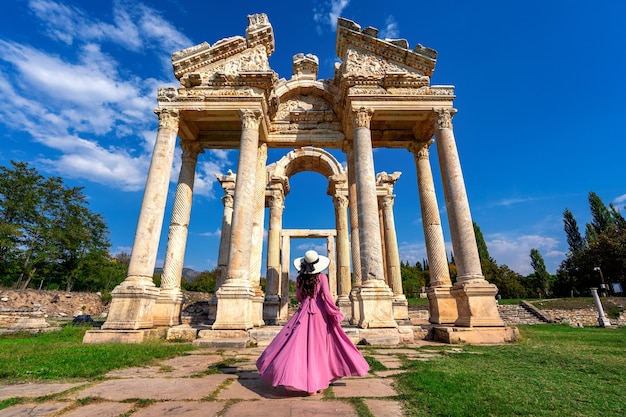 Free photo beautiful girl walking at aphrodisias ancient city in turkey.