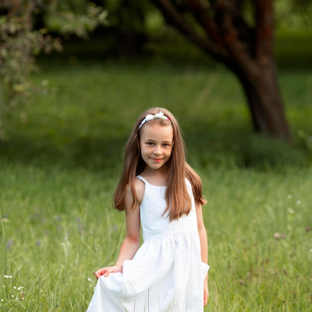 Beautiful girl wearing a white dress