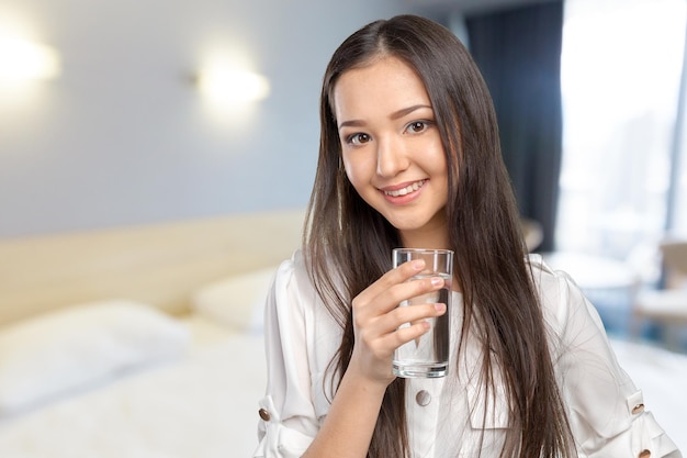 Beautiful girl with a cup