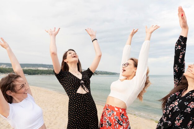 Beautiful girls having fun at beach