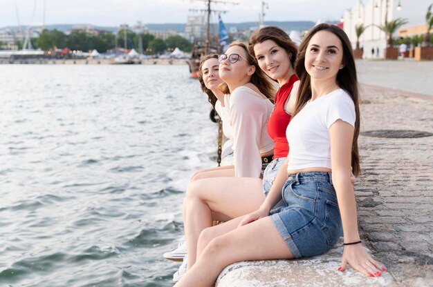 Beautiful girls having fun at beach