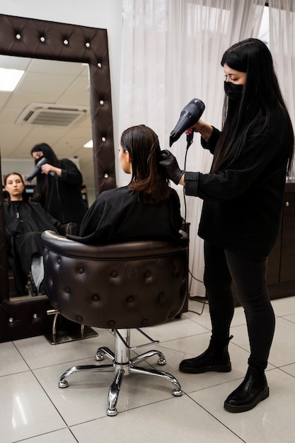 Free photo beautiful hair in the process of keratin treatment