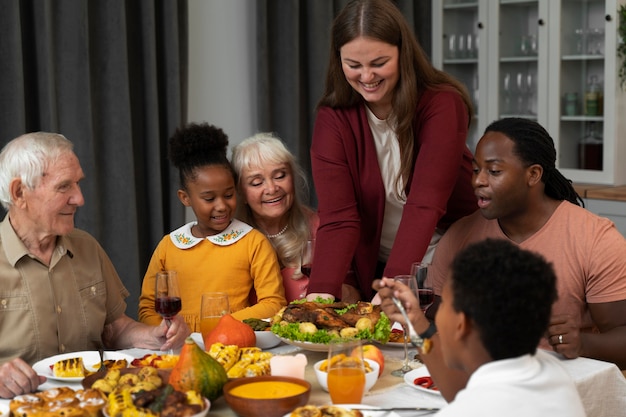 Beautiful happy family having a thanksgiving dinner together