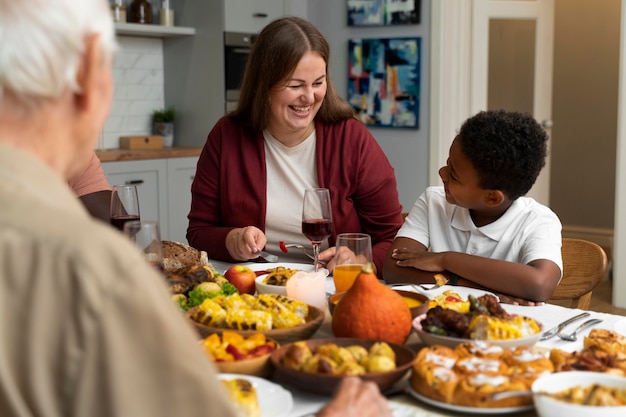 Beautiful happy family having a thanksgiving dinner together