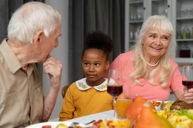 Beautiful happy family having a thanksgiving dinner together