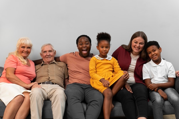 Free photo beautiful happy family posing together on thanksgiving day