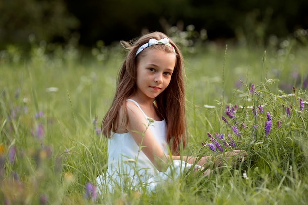 Beautiful happy girl having fun in nature