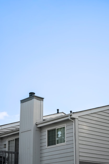 Beautiful house with chimney and blue sky