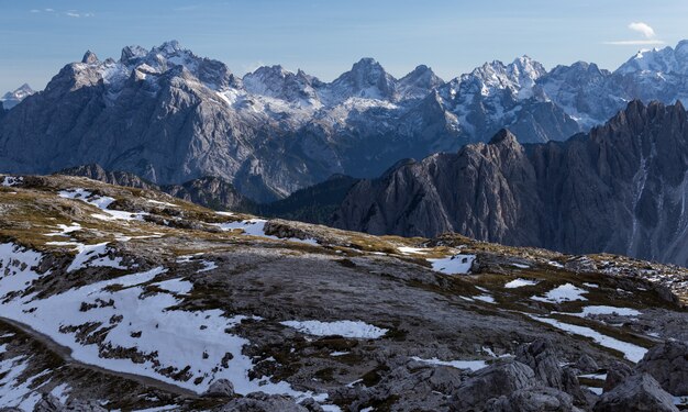 Beautiful landscape in the Italian Alps under the cloudy sky in the morning