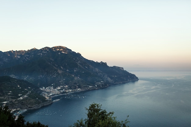 Beautiful landscape of Naples covered with evening lights