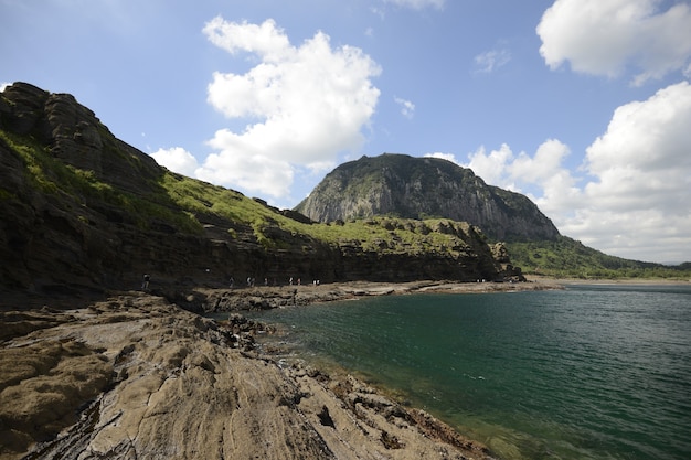 Beautiful landscape shot of large rock formations near the coast in Jeju Island, South Korea