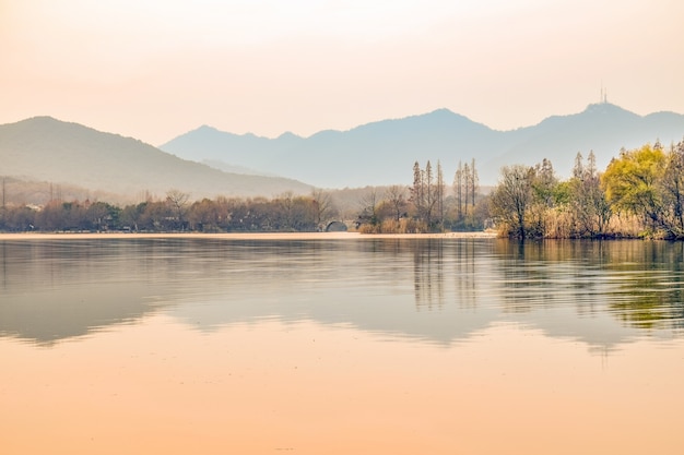 Beautiful landscape with river and bridge in the background