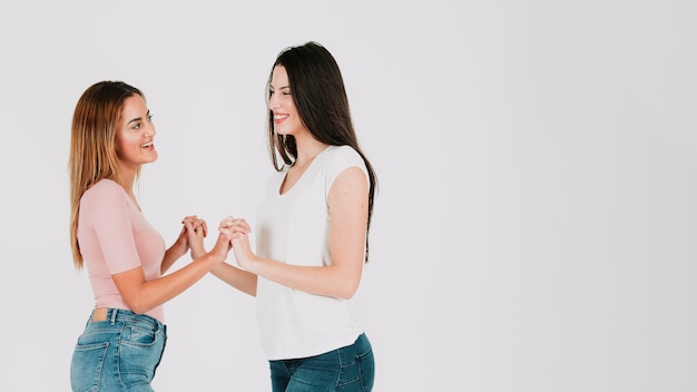 Beautiful lesbian couple holding hands