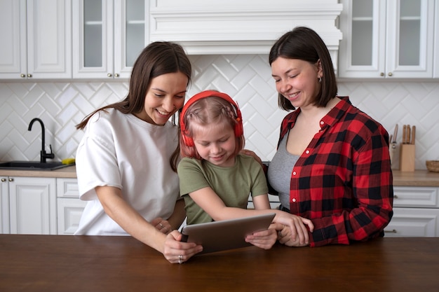 Beautiful lesbian couple with their daughter