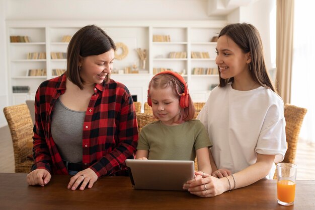 Beautiful lesbian couple with their daughter