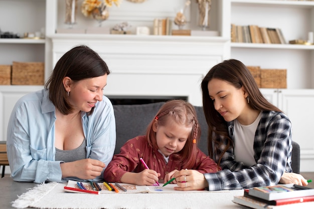 Beautiful lesbian couple with their daughter