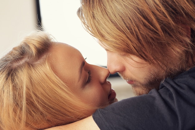 Beautiful lovely couple at home