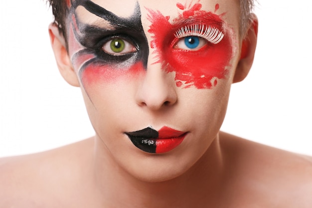 Free photo beautiful man with abstract make up