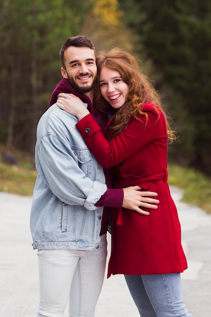 Beautiful man and woman hugging