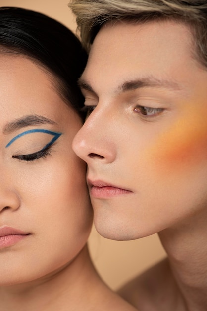 Beautiful man and woman wearing make-up