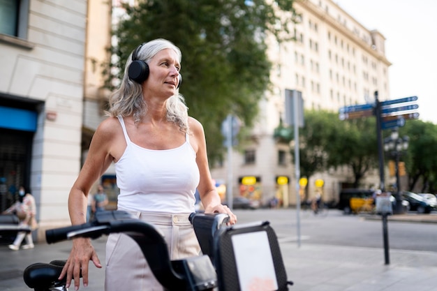 Beautiful mature woman spending time around city