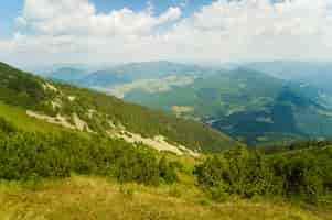 Free photo beautiful meadows on  mountains