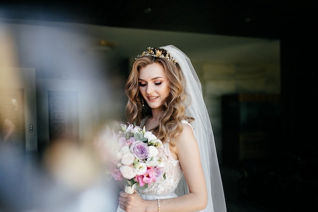 Beautiful model girl in white dress. Man in suit