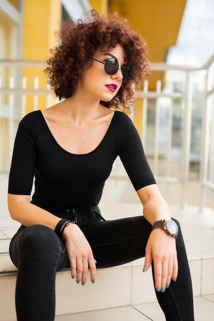 Beautiful model sitting down