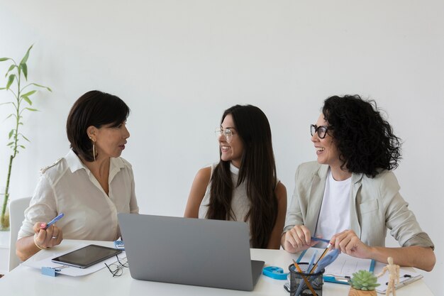 Beautiful modern women working together