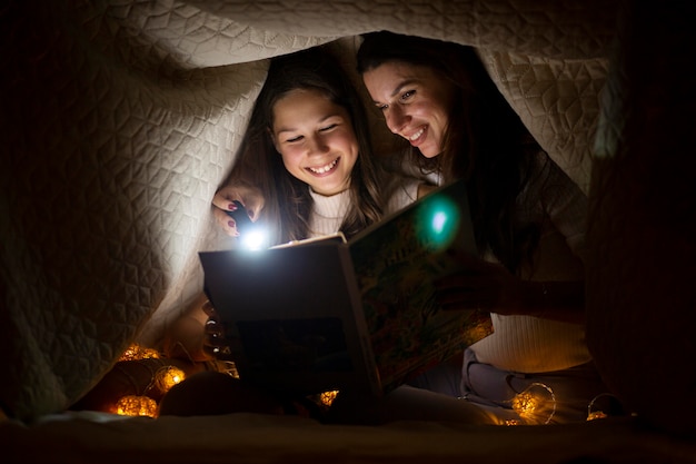 Beautiful mother and daughter on christmas