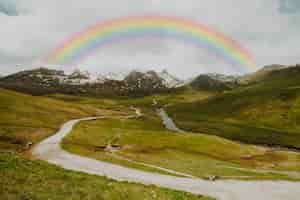 Free photo beautiful natural landscape with rainbow