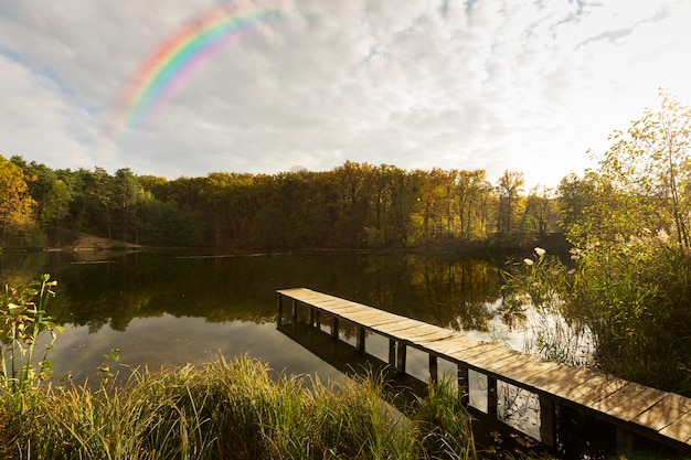 Free photo beautiful natural landscape with rainbow