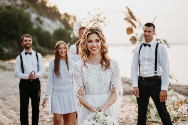 Beautiful people celebrating a wedding on the beach