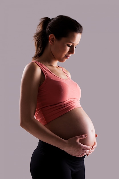 Beautiful pregnant woman isolated 