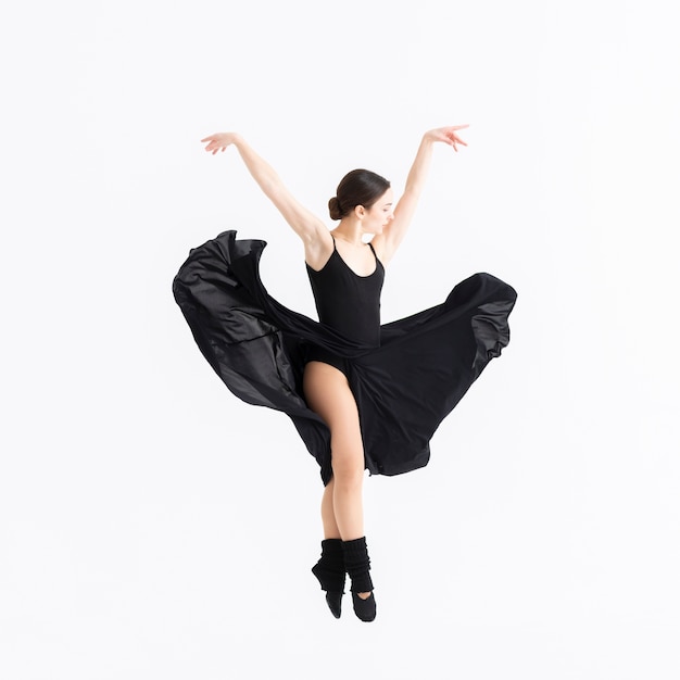 Free photo beautiful professional woman dancing with grace