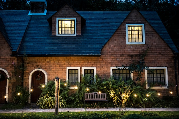 Beautiful red brick house with decorative lights