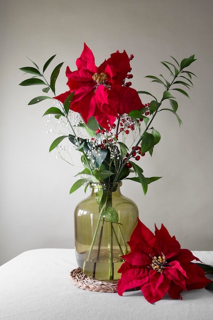 Free photo beautiful red poinsettia arrangement