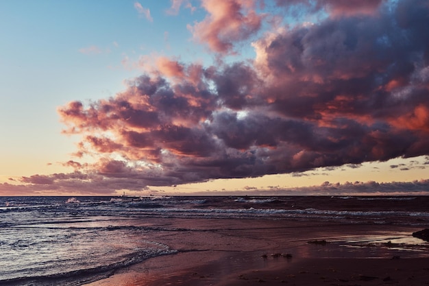 Beautiful and romantic sunset over the sea. Sunset on a beach.