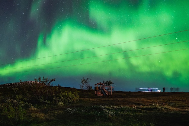 Free Photo beautiful scenery of aurora borealis in the night sky of tromso lofoten islands, norway