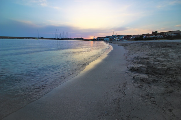 Beautiful scenery of a beach during sunset under the breathtaking sky